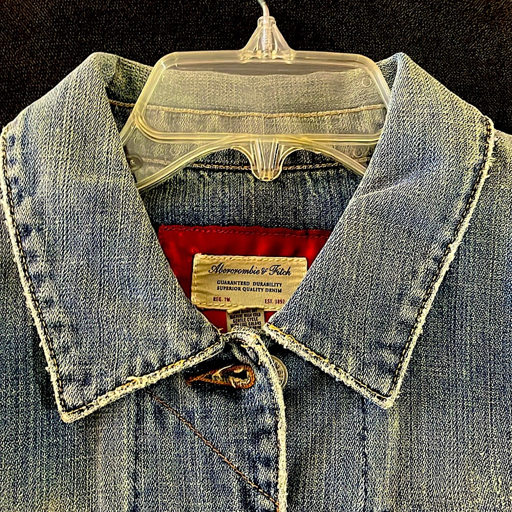 A&F like new distressed Jean jacket, size L. Cute button detailing and pockets